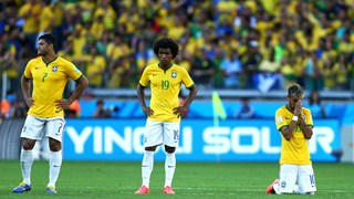 Hulk, Willian and Neymar of Brazil prepare for penalty kicks