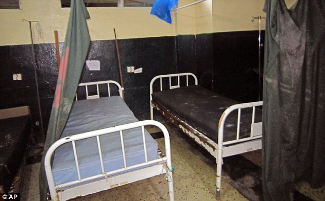 Abandonado: leitos hospitalares vazios são vistos em Redenção depois de enfermeiros e pacientes fugiram devido às mortes Ebola