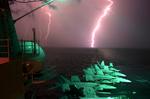 The USS Eisenhower in a lightning storm